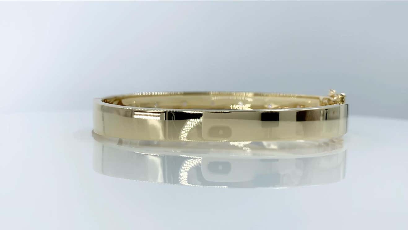 Princess Bezel 0.55 TCW Round Cut Diamond Yellow Gold Bangle Bracelet